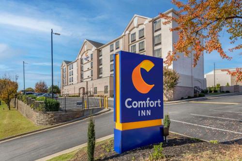 a sign for a comfort inn in front of a building at Comfort Inn Greensboro - Kernersville in Greensboro