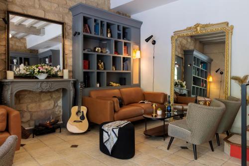 Гостиная зона в Hôtel Saint Martin Bastille