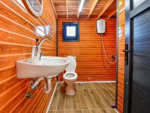 a bathroom with a sink and a toilet at TÜRKMEN VİLLAS in Demre