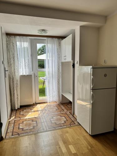 Una cocina o cocineta en Kwatera Studio Hoczew
