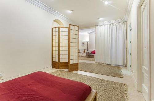 Apartamento Prado en Madrid tesisinde bir odada yatak veya yataklar