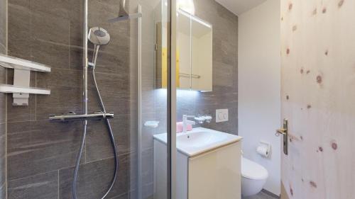 a bathroom with a shower and a sink at Abitaziun Haus Westend 7A - St Moritz in St. Moritz