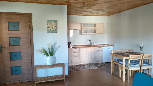 Køkken eller tekøkken på Domek letniskowy Bursztynek