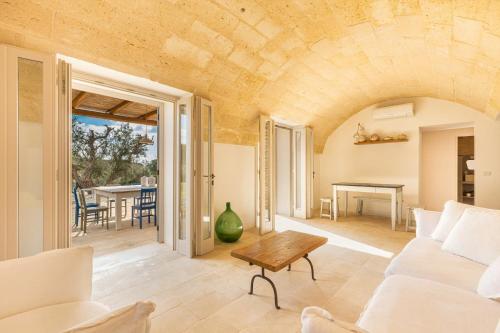 En eller flere senge i et værelse på Salento Urbes Collection