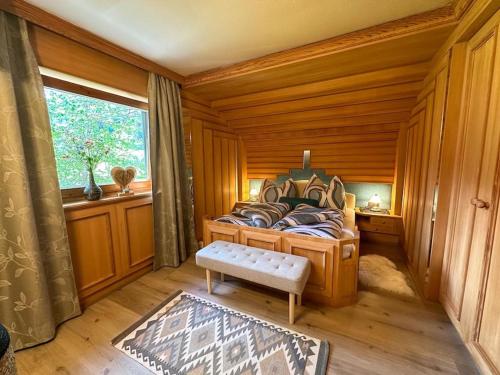 Postel nebo postele na pokoji v ubytování Landhaus Alpenglück