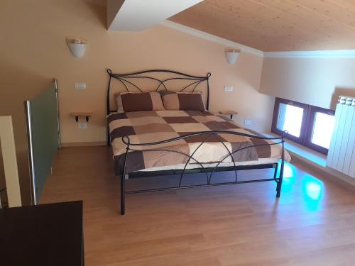 Postel nebo postele na pokoji v ubytování Casa FontaGusta - Digital Detox am Idrosee