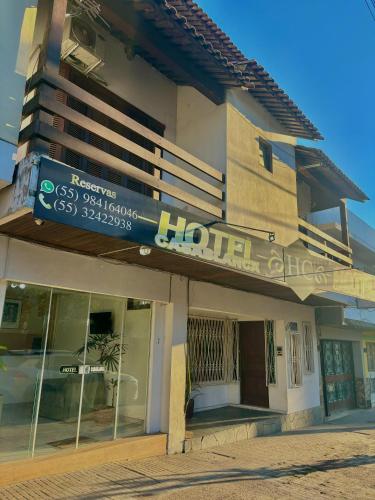 a hotel sign on the side of a building at Hotel CasaBlanca in Santana do Livramento