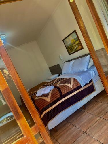 - une chambre avec un lit dans l'établissement HOTEL Casablanca, à Santana do Livramento