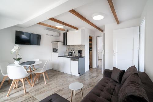 Η κουζίνα ή μικρή κουζίνα στο Apartament Dom Goscinny Justyna