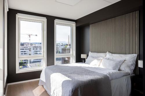 Postel nebo postele na pokoji v ubytování Modern Elegance in Oslo