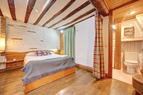 Postel nebo postele na pokoji v ubytování Casa Ana Mari II by Clabao