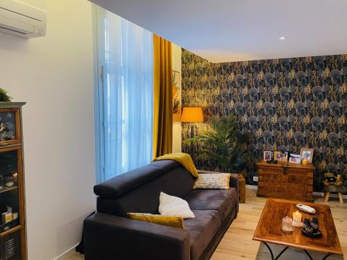Posedenie v ubytovaní Douillet et coquet appartement climatisé - Parking privé gratuit - Centre Montpellier