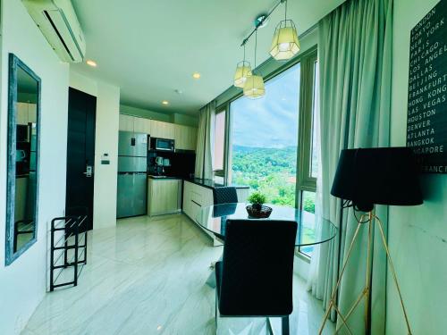 Кухня или мини-кухня в Oceana Sea View - Kamala Beach
