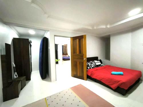 Postel nebo postele na pokoji v ubytování Homestay Last world tambun