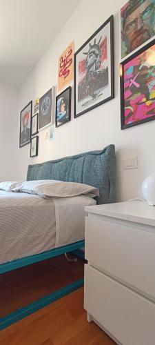 Katil atau katil-katil dalam bilik di Sant'Erminio comfort rooms