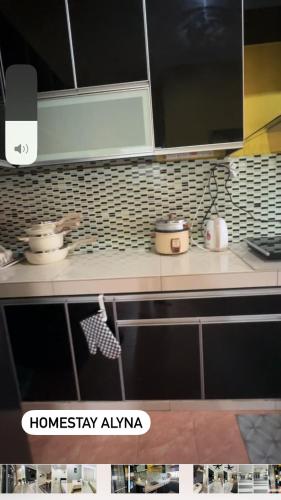 Kuchyň nebo kuchyňský kout v ubytování Homestay AlyNa