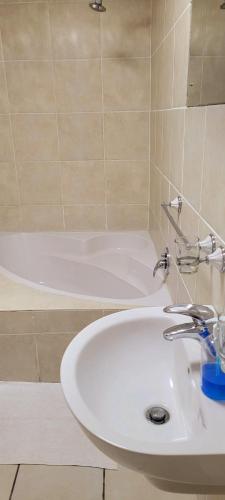 Un baño de Kennington Palms B&B/Self Catering