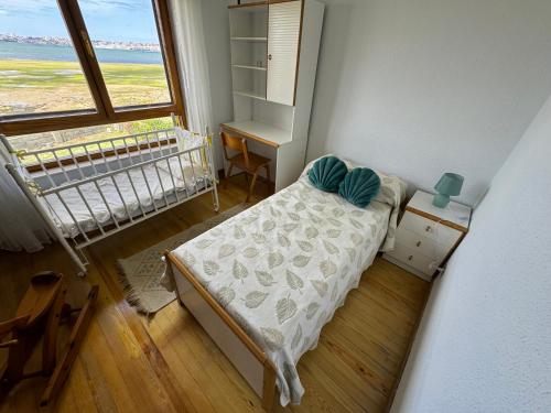 Ένα ή περισσότερα κρεβάτια σε δωμάτιο στο Casa Revilla Playa