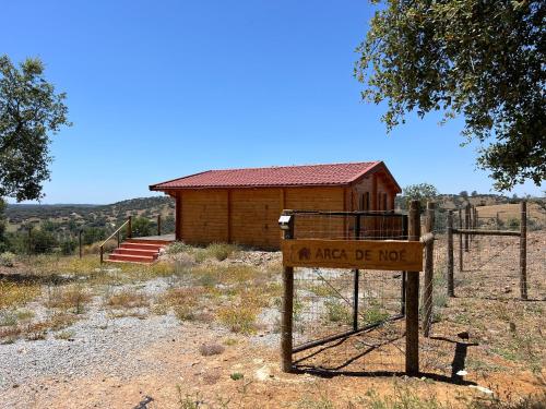 a sign in front of a small building at Herdade Terra rica in Alcácer do Sal
