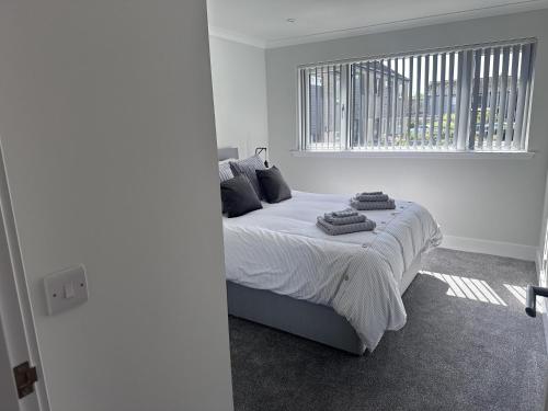 Katil atau katil-katil dalam bilik di St Andrews Luxury 2-Bed House Sleeps 4