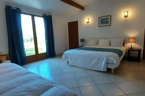 Postel nebo postele na pokoji v ubytování La maison de Maitre Meunier