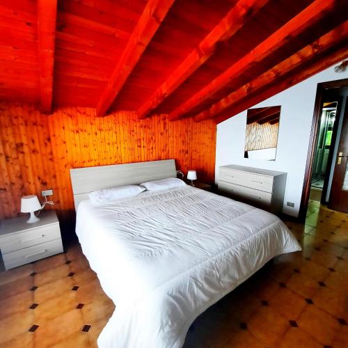 Katil atau katil-katil dalam bilik di Appartamento Belvedere - Your Mountain Holiday
