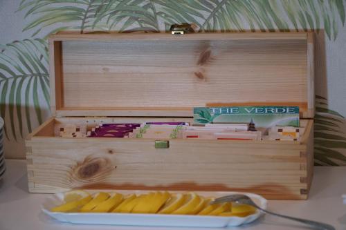 a wooden box with food in it on a table at Hotel President in Montecatini Terme