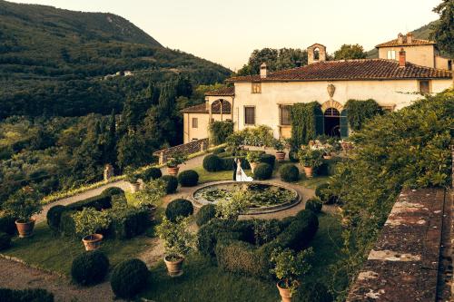 an aerial view of a house with a garden at Villa Rucellai in Prato