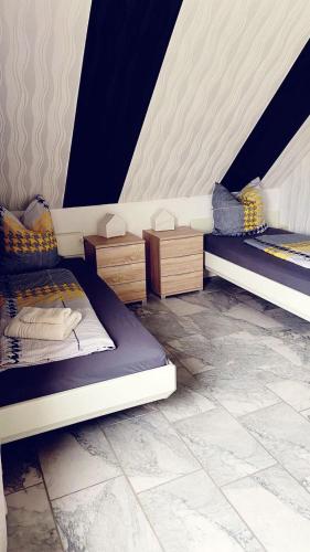 a room with two bunk beds in a room at IIA Apartments in Warzen