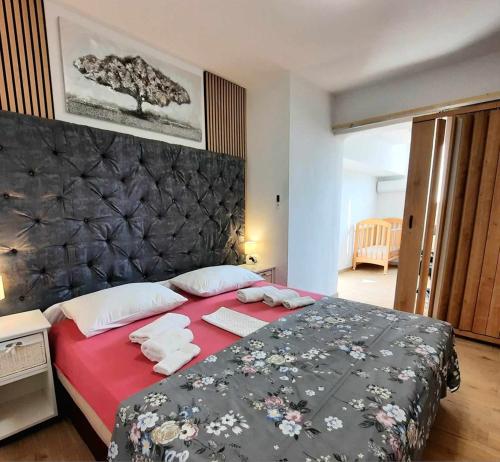 Posteľ alebo postele v izbe v ubytovaní Apartment Rustica Zadar