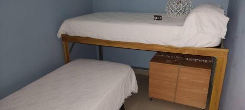 a couple of bunk beds in a room at playa portonovo in Portonovo