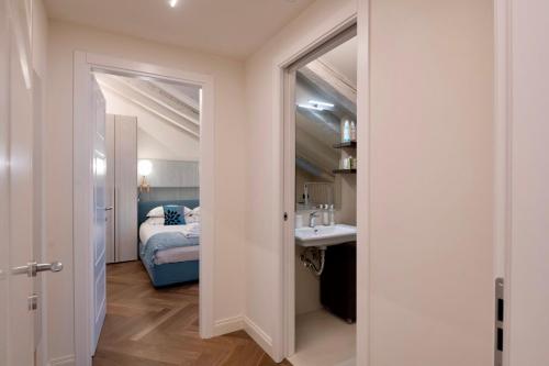 Ένα ή περισσότερα κρεβάτια σε δωμάτιο στο Casa Romano Suites