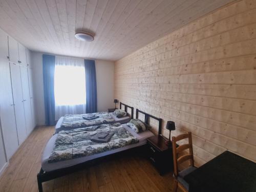 Postel nebo postele na pokoji v ubytování Elch Zimmer Wilderness Life