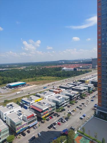 an aerial view of a parking lot in a city at KLIA Travel Homestay - 3R 2B - WIFI & NETFLIX in Sepang