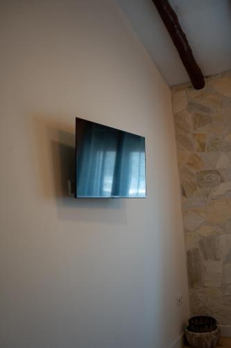Hotel Boutique - Estancia dos Olivosにあるテレビまたはエンターテインメントセンター