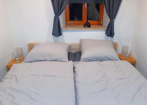 Katil atau katil-katil dalam bilik di Dreiburgen Ferienwohnung Schlossblick