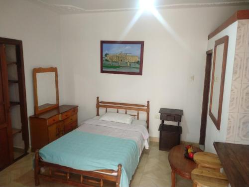 Postel nebo postele na pokoji v ubytování Casa Larimar