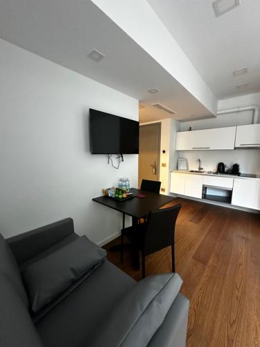 Kuchyň nebo kuchyňský kout v ubytování GRANDI 32 Boutique Residence