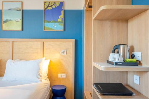 Ένα ή περισσότερα κρεβάτια σε δωμάτιο στο ibis Styles Biarritz Plage