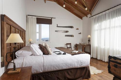 Postel nebo postele na pokoji v ubytování Hotel Boutique La Yegua Loca