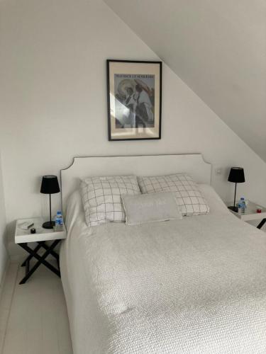 Posteľ alebo postele v izbe v ubytovaní Duplex Vannes centre