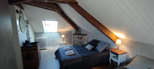 Ένα ή περισσότερα κρεβάτια σε δωμάτιο στο Chambres d'hôtes Lamourio