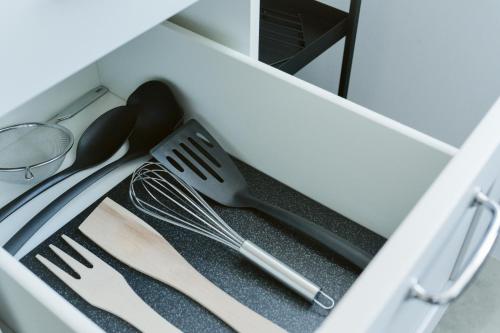 a drawer filled with utensils in a kitchen at Mieszkanie do wynajęcia Kraśnik in Kraśnik
