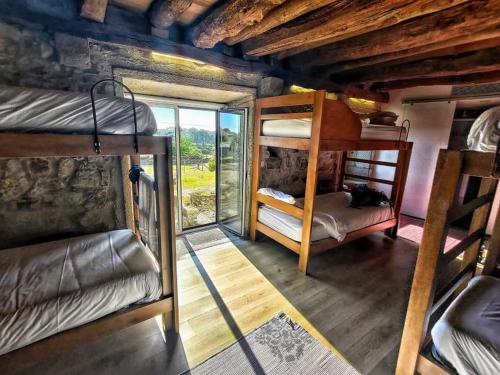 Postel nebo postele na pokoji v ubytování Albergue Casa do Sardão