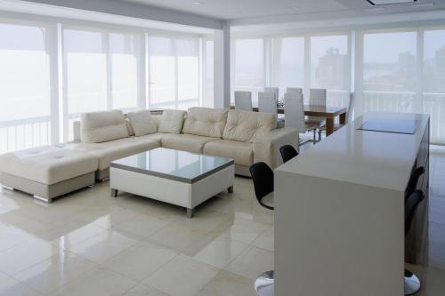 a living room with a couch and a table at Texas in Alicante