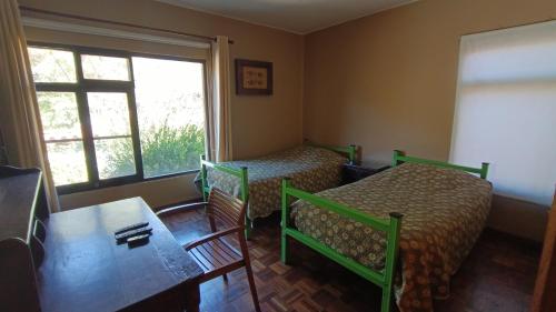 Un pat sau paturi într-o cameră la Casa 363/ 2-8 personas