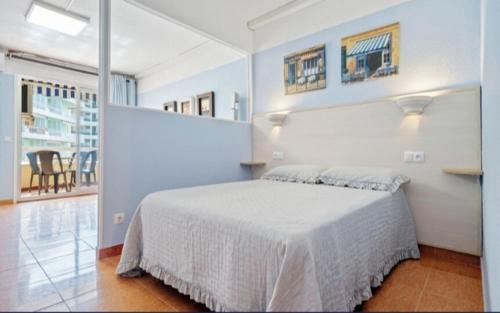 Postel nebo postele na pokoji v ubytování Apartamentos TSS Alboran
