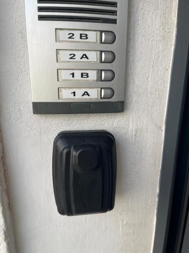 a close up of a door with a remote control at CA LIDIA -Allotjament Rural EL BALCONET in Benimantell
