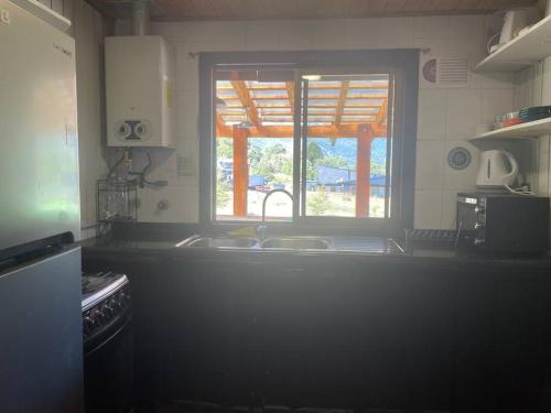 ครัวหรือมุมครัวของ Cómoda cabaña con hermosa vista