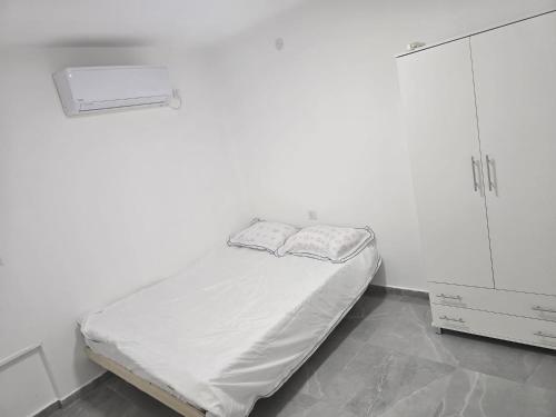 Postel nebo postele na pokoji v ubytování Royal Magic